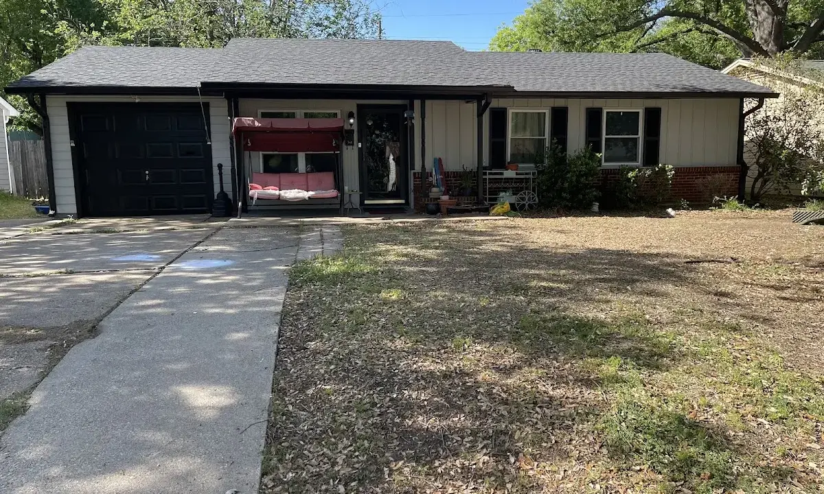 Asphalt Shingle Roof Repair crew at work on a residential roof in Ballenger Creek